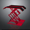 Red Scissor Lift Platform With Black Top And Metal Frame For Industrial Lifting