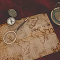 Vintage World Map With Magnifying Glass Compass And Brass Lantern On Wooden Table
