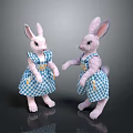 Adorable Stuffed Rabbit Dolls Wearing Blue And White Checkered Dresses Standing On Black Reflective Surface