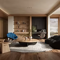 Modern Living Room With Wooden Bookshelves Blue Chair Black Sofa And Round Coffee Table