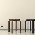 Minimalist Modern Brown And Black Stools With Curved Legs In Light Room