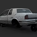 Abandoned White Sedan With Broken Windows Rust And Damaged Tires