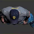 Man Wearing Striped T-Shirt And Blue Jeans With Cap Standing Against Gray Background