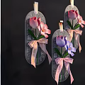 Hanging Glass Tag Vase Flowers with Pink Purple Blooms and Decorative Pink Bows