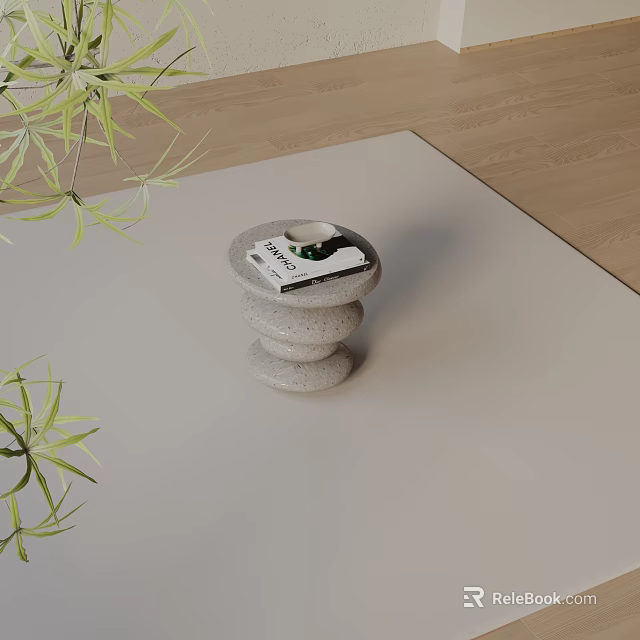 Stacked Stone Side Table with Magazine and Decor Surrounded by Green Leaves on Wooden Floor 3d model 