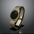 Elegant Golden Mesh Strap Watch With Black Dial On Display Stand