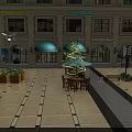 Spring Fair 2024 Commercial Street With Lit Shop Windows Outdoor Seating And Christmas Tree
