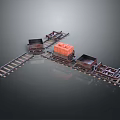 Detailed miniature model train track with orange and black carriages on metal rails