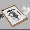 Clipboard With Sketch Drawing Pen Origami Decoration And Small Black Object On White Background