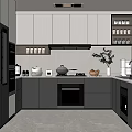 Modern Kitchen Interior With Gray Cabinets Built-in Appliances And Countertop Plant