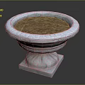 Decorative Round Stone Planter With Carved Details And Soil Filled Interior
