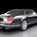 Luxury Black Sedan With Shiny Finish Front Grille And Silver Wheels