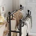 Black Metal Shoe Rack with Hanging T Shirts Shirts and Lower Storage Basket