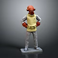 Red Headed Game Movie Character In Yellow Vest Gray Pants With Hands On Hips Statue