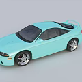 Light Blue Two Door Sports Car With Black Windows And Alloy Wheels Spoiler
