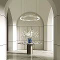Modern Entryway Featuring Arched Design Circular Pendant Light Marble Top Table Blue Vase White Flowers
