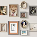 Decorative Wall With Various Framed Artworks And Paintings In Different Styles