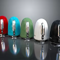 Assorted Colored Electric Kettles with Silver Handles on Reflective Surface