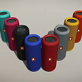 Vibrant Cylindrical Speakers with Multiple Colors Arranged in Arc and Brand Logo