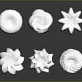 White Whipped Cream Dessert Decorations With Various Flower Spiral And Round Shapes On Black Background