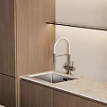 Modern Kitchen Interior With Dark Light Wood Cabinets Counter And Oven