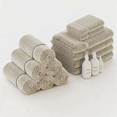 Soft Neutral Color Cotton Bath Towels Stacked And Rolled With Bath Product Bottles 3d model