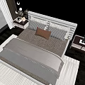 Double Bed With Gray White Bedding Striped Pillows Brown Cushion And Bedside Tables