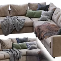 Upholstered Sectional Sofa With Various Colored Pillows And Soft Knit Blankets 3d model
