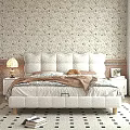 Double Bed with White Upholstered Headboard Floral Wallpaper Nightstand and Table Lamp in Bright Bedroom