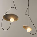 Modern Pendant Lights With Curved Black Wires Disc Shaped Shades And Round Illuminated Bulbs