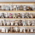 Colorful Plush Stuffed Toys Collection Displayed On Wooden Shelves With Various Animal Designs