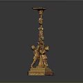 Gold Carved Candlestick Sculpture With Putti Figures And Ornate Base
