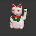 White Lucky Cat Figurine With Red Ears Green Collar Yellow Accent And Raised Paw