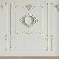 Elegant White Wall Paneling With Intricate Carvings And Circular Decorative Frame