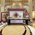 Elegant Tea Break Area In Luxurious Lobby With Exquisite Pastries And Flower Decorations