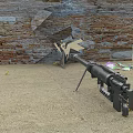 Black Machine Gun Placed on Sandy Ground with Bullets Near Broken Brick Wall and Debris