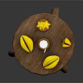 Wooden Round Table With Bright Yellow Origami Shapes And Small Decorative Candle