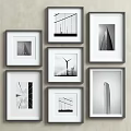 White Framed Black And White Architectural Photos On Gray Wall Gallery