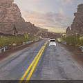 Stunning Sunset Desert Canyon Highway Landscape With Red Rock Cliffs Cactus And Traveling Cars