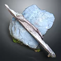 Natural Blue Rock Formation With Long Textured Appendage And Green Moss Base