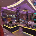 Modern KTV Lounge Interior Design With Colorful Lighting Sofas And Glass Tables