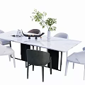 Modern Dining Table Set With White Marble Top Six Chairs And Green Plant Vase