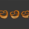 Salted Orange Pretzels Arranged In Row With Glossy Surface On Dark Background