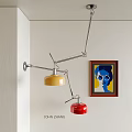 Modern Adjustable Arm Pendant Light With Yellow Red Shades And Framed Painting