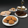 Delicious Assorted Desserts On White Plates Including Chocolate Chip Cookies Ladyfingers And Chocolate Eclairs