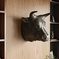 Stylish Bull Head Wall Decor On Wooden Wall With Shelves And Decorative Items