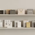 Luxury Brand Shopping Bags Display On White Shelves With Various Designs