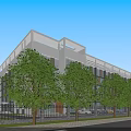 Aerial Planning View of Modern Building With Surrounding Greenery Parking Lot and Road