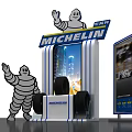 Michelin Display Stand Featuring Waving Michelin Man And Race Track Design