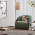 Elegant Green Upholstered Single Sofa with Side Table and Bamboo Painting in Cozy Living Room